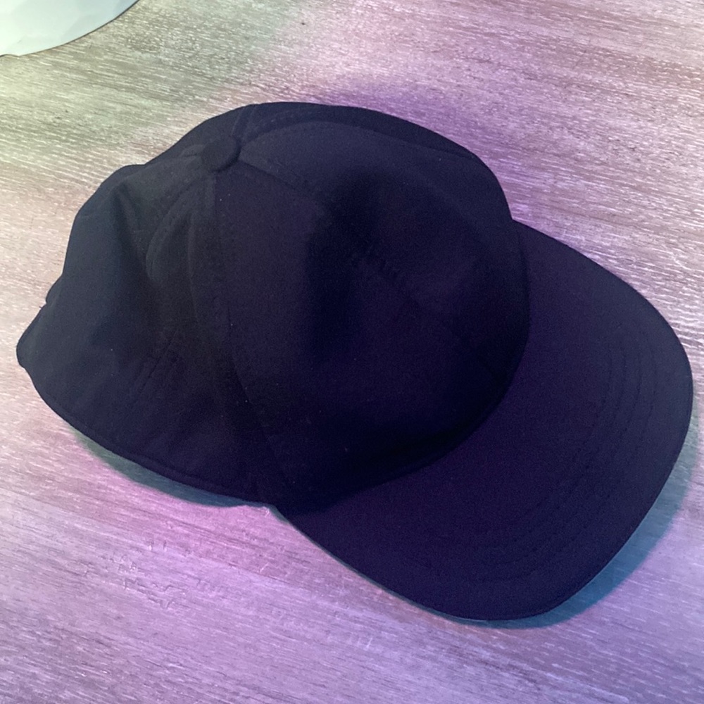 This is a nice black hat/cap. Even has an opening for a ponytail.